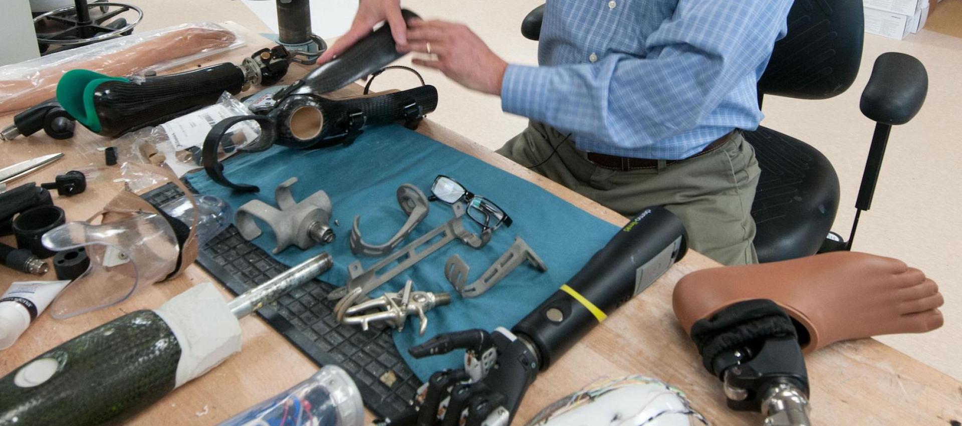 Multiple prosthetic devices on work bench